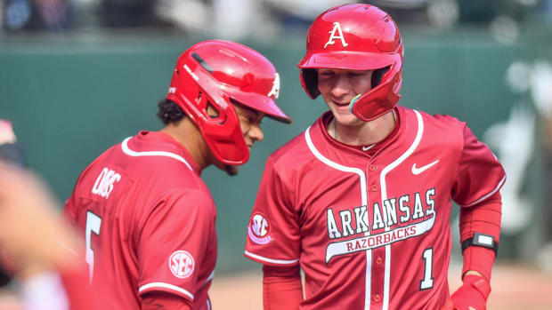 Razorbacks Kendal Diggs and Ty Wilmsmeyer against James Madison
